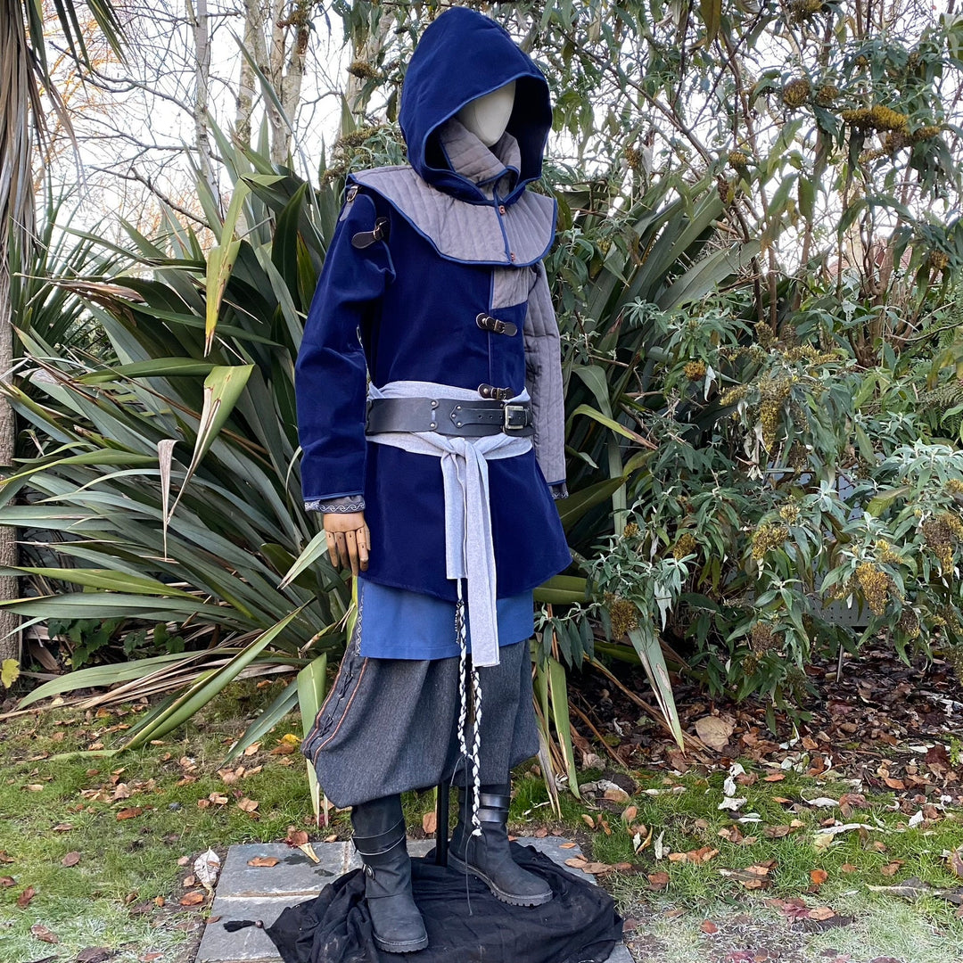 Mannequin in medieval LARP attire, side angle, blue hood and jacket.