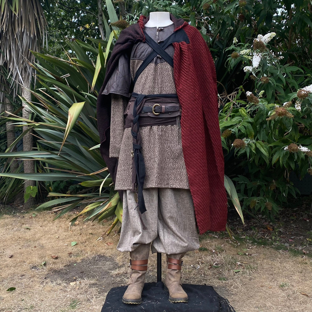 Medieval LARP outfit with red cloak and leather belt, full front view.