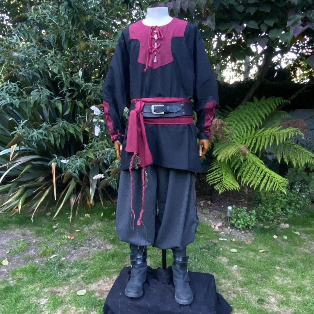 Medieval LARP outfit front view, featuring a black and red viking tunic, trousers and sash.
