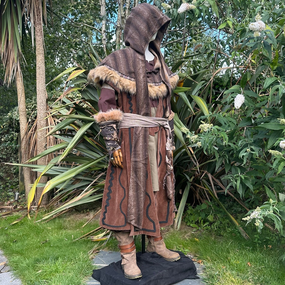 Medieval LARP costume with fur-trimmed hood and detailed vambraces.