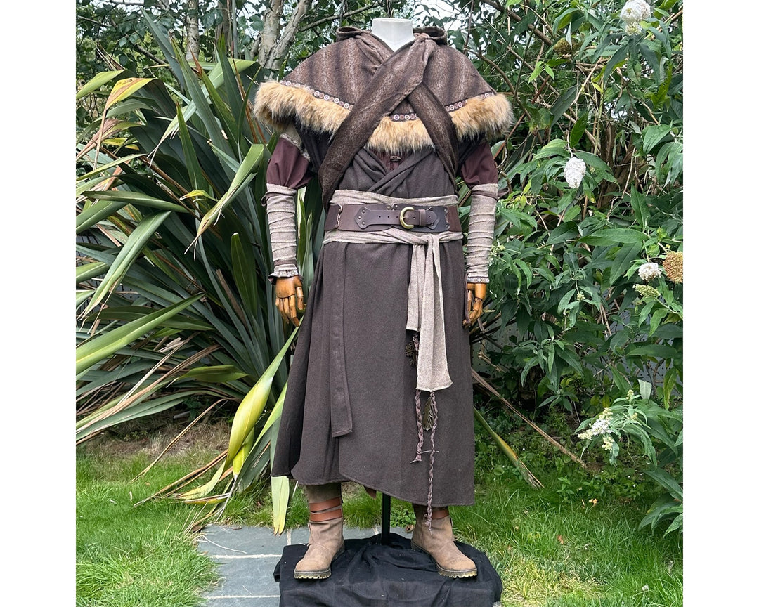 Medieval LARP costume front view featuring brown hooded cloak, fur trim hood, arm wraps, leather.